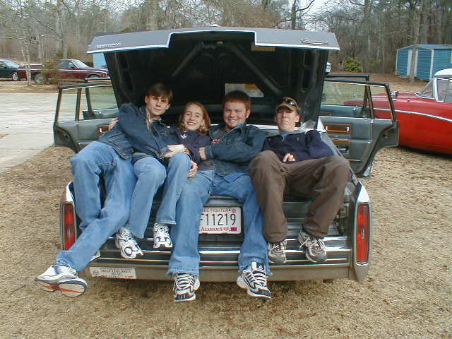 Bailey, Winter, Michael Wayne, & Patrick in Caddy about to leave for Moultrie